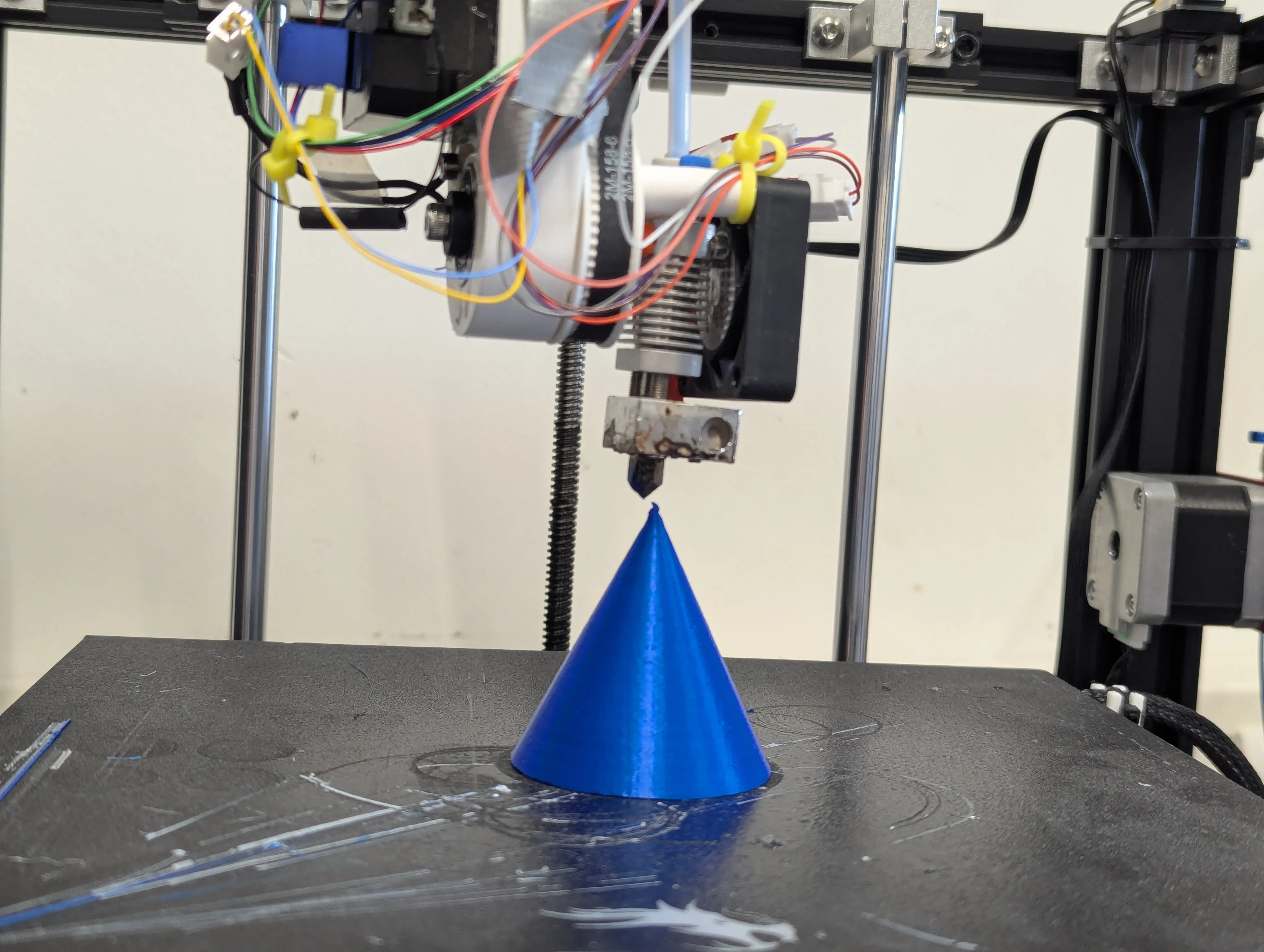 Nozzle positioned at cone tip showing offset error